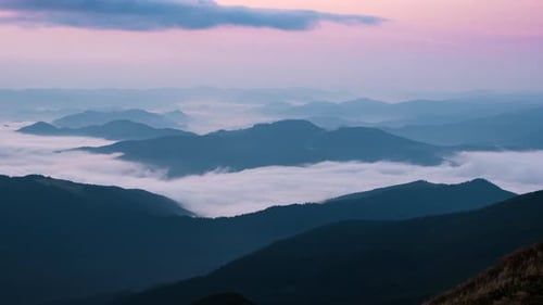 Mountain Range with Fog at Sunrise