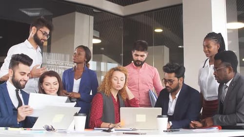 Diverse Team Collaborating in Modern Office Setting