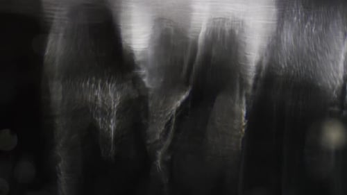 Abstract Shimmering Light Effects on Dark Background