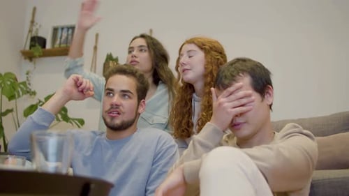 Friends Watching Together in Cozy Home