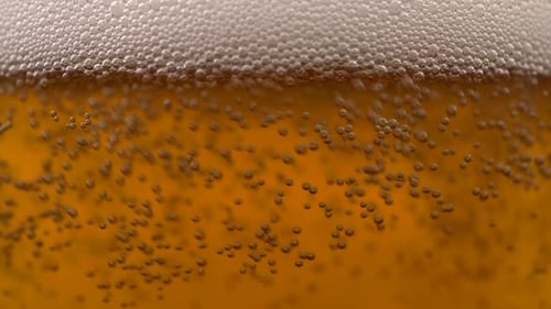 Refreshing Beer with Bubbly Foam Close-Up