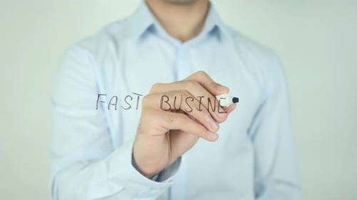 Writing Fast Business on Clear Surface