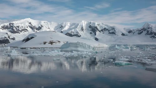 Antarctic Mountains and Ice Floes Aerial View