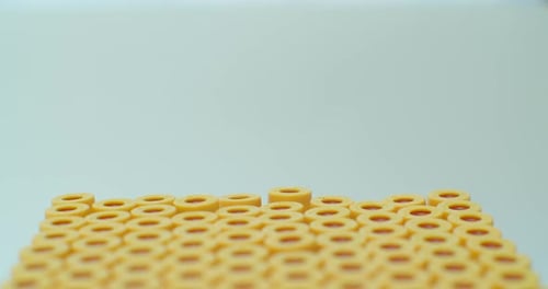 Hands in Blue Rubber Gloves Put in the Tube To a Rack for Test Tubes and Checking Covid-19 Close Up