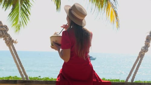 Happy Carefree Woman Enjoying Beautiful Sea View on the Beach