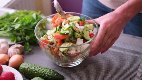 Fresh Salad Preparation Mixing Colorful Vegetables
