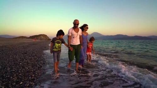 Happy Family on The Beach