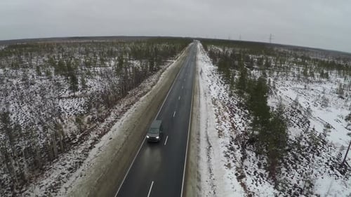 Car on the Asphalt Road