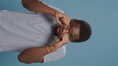 Young Man Boxing in Portrait Mode