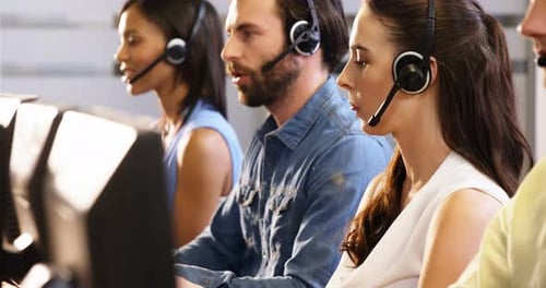 Customer Service Team Working in Call Center