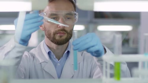 Scientist Conducts Experiment in Modern Laboratory