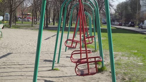 Empty Swings In Playground