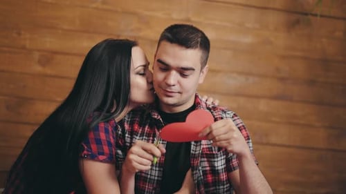 Happy Couple Crafts Heart Together