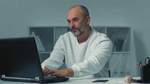 Tired Business Man Touching Head Working Hard on Laptop Upset Exhausted Office Work Frustrated