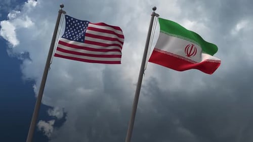 American and Iranian Flags Waving Symbolizing International Relations