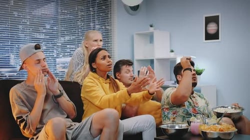 Mixed Race Young People Express Disappointment While Watching TV