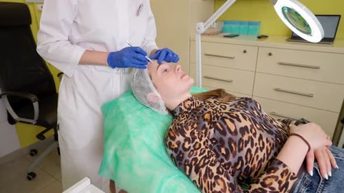 Eyebrow Tattoo Procedure in Beauty Clinic