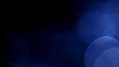 Abstract Background with Shifting Blue Blurred Lights