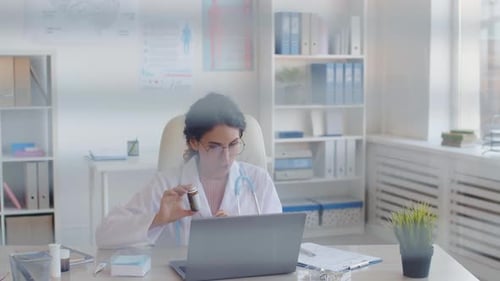 Female Doctor Telemedicine Appointment in Clinic Office