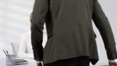 Man Having Job Interview with Female HR Manager