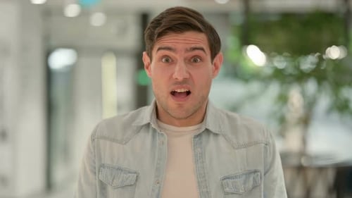 Man Expressing Confusion and Frustration Mid Shot