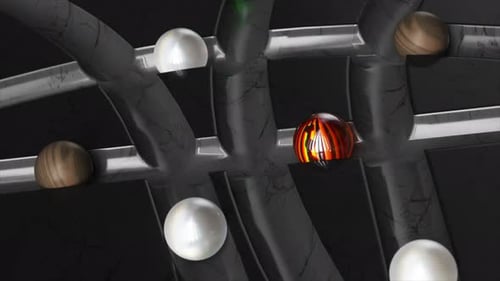 Colored Balls Roll Around the Dark Marble Labyrinth