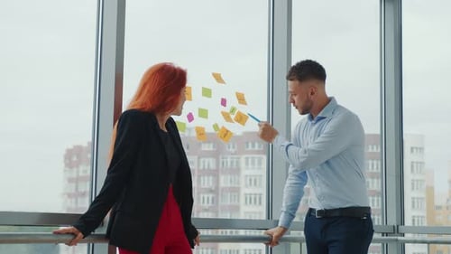 Business Professionals Collaborating on Ideas in Modern Office