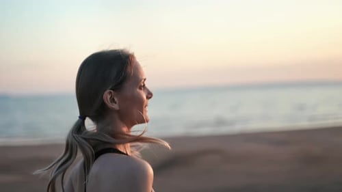 Happy Athletic Blonde Woman Running Jogging Sunset Beach Nature Landscape Slow Motion