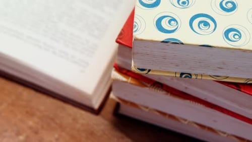 Close-up of books stacked on a table
