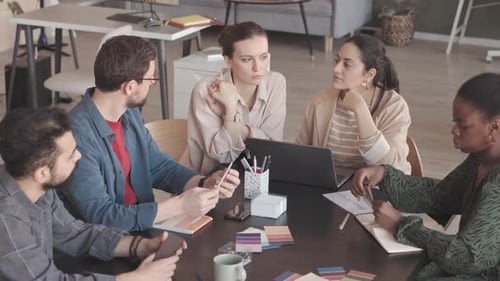 Creative Colleagues Brainstorming in Office