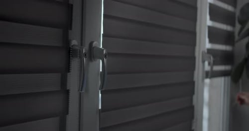 Man Installing Cassette Roller Blinds on Windows