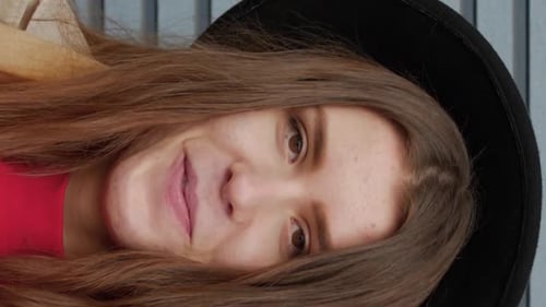 Vertical Video of Girl Student Emotionally Smiling Closeup
