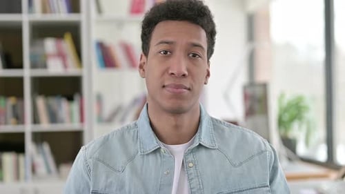 Young Adult Giving Okay Hand Sign