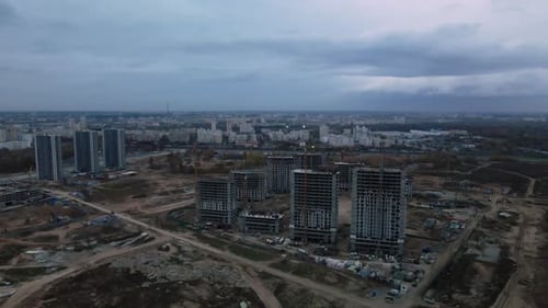 Construction of modern multi-storey buildings. Construction of a new city block.