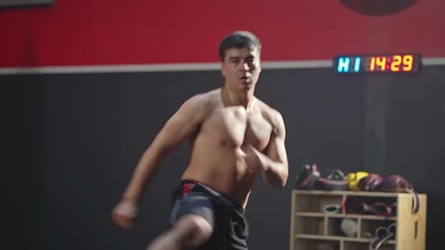 Active Caucasian attractive young sportsman fitness trainer workout exercise doing boxing for health