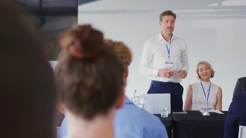 Man Presenting at a Corporate Event