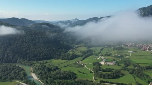 Verdant Valley with River and Rolling Hills Aerial View