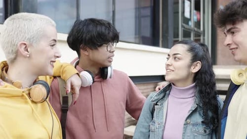 Group of Young Multiracial Students Friends Hanging Out Together at University