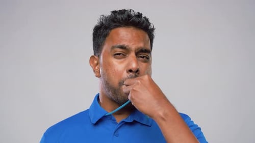Indian Referee Whistling and Showing Red Card