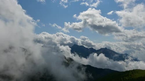 Time Lapse Of Clouds Over The Mountains In Strong Post Thunderstorm Motion