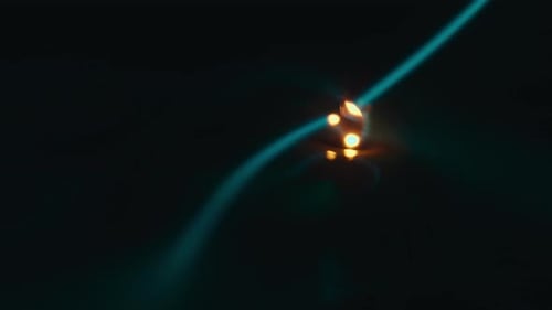 Abstract animation with teal lines and glowing elements