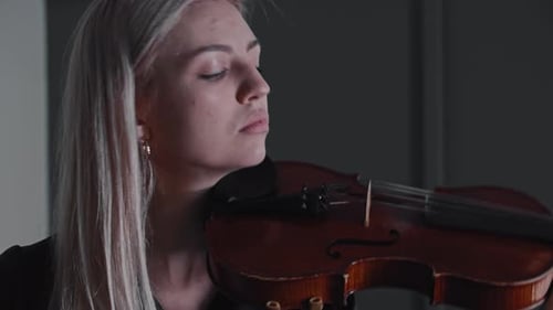 Woman Playing Violin, Close Up Shot