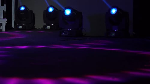 Four Colored Projectors on the Stage Lights Farm