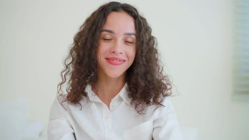 Smiling Woman With Curly Hair Close Up