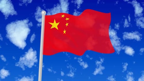 Waving Flag of China Against Blue Sky with Clouds