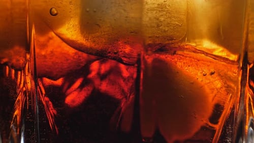 Icy Beverage with Bubbles in Glass Close Up