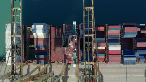 Aerial View. International Port with Crane Loading Containers in Import Export Business Logistics.