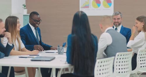 Smiling Business Team Having Successful Meeting