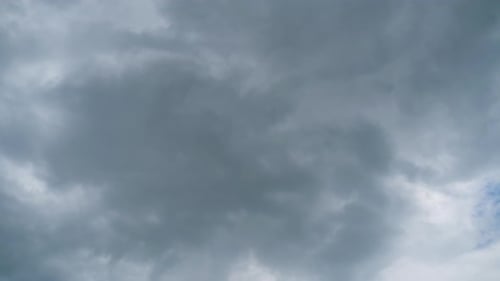 Moody Storm Clouds Rolling Slowly Across the Sky