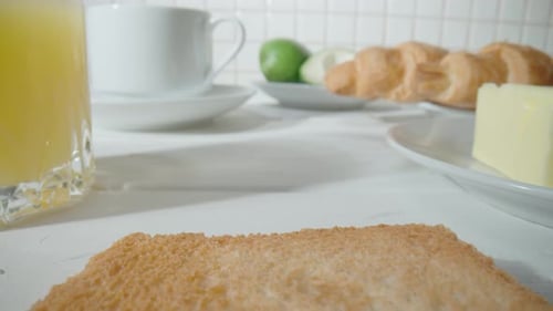Inviting Breakfast of Toast, Juice, Croissants